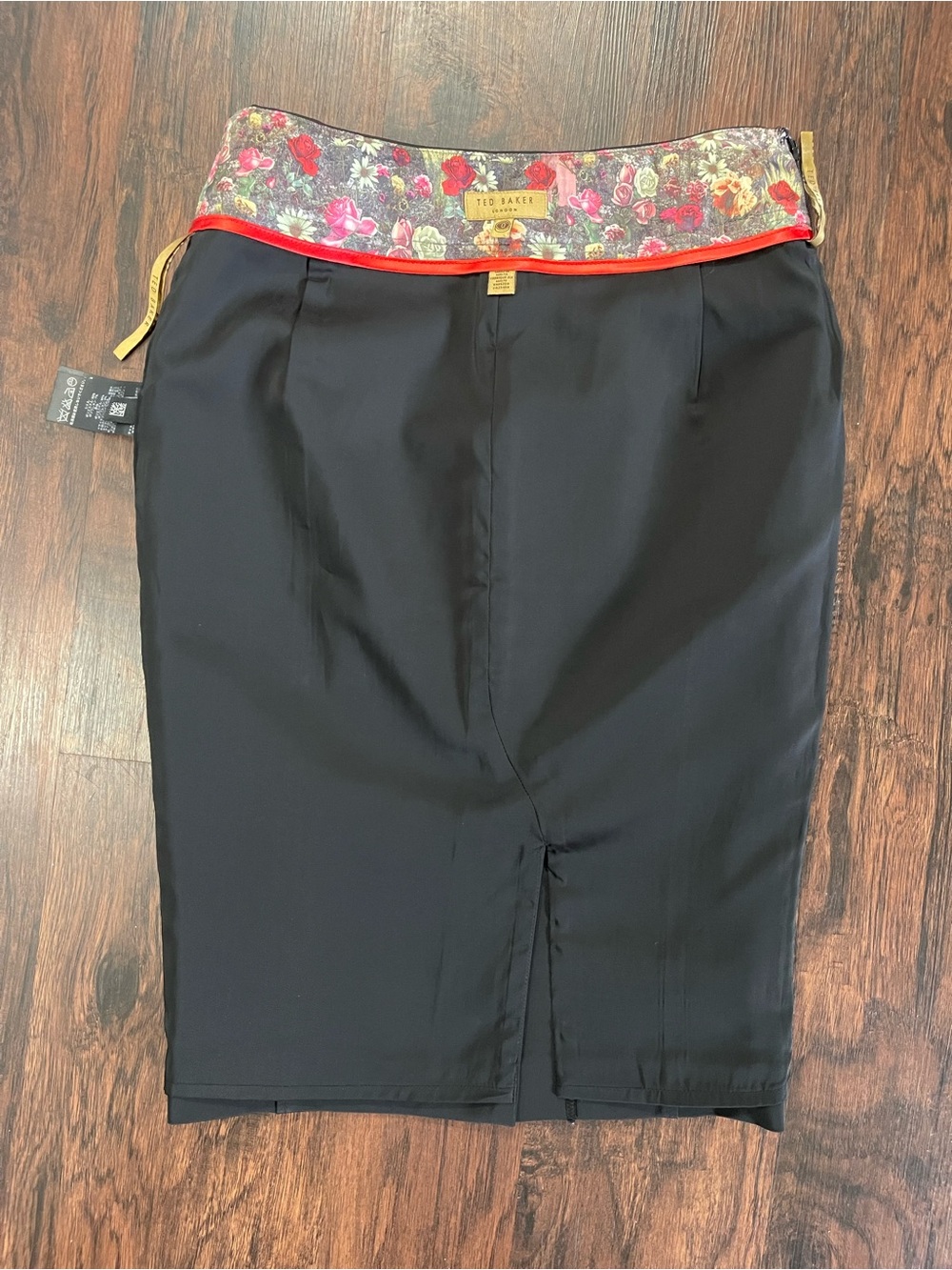 Ted Baker Black Pencil Skirt with Floral Waistband on the inside. Size 0